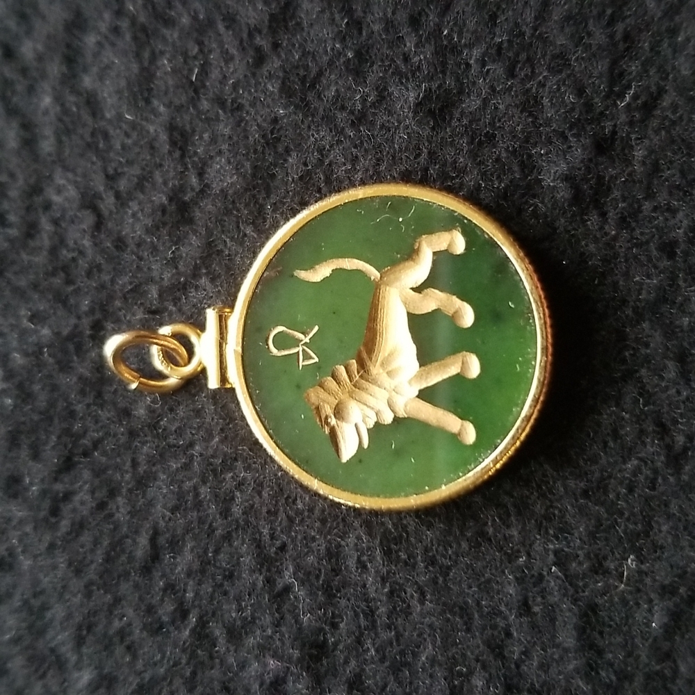 Jade lion pendant